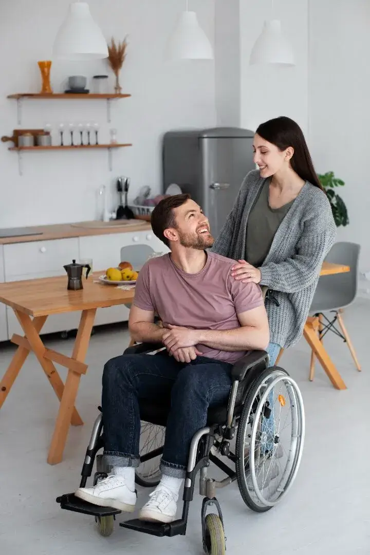 compressed young adult helping disabled friend